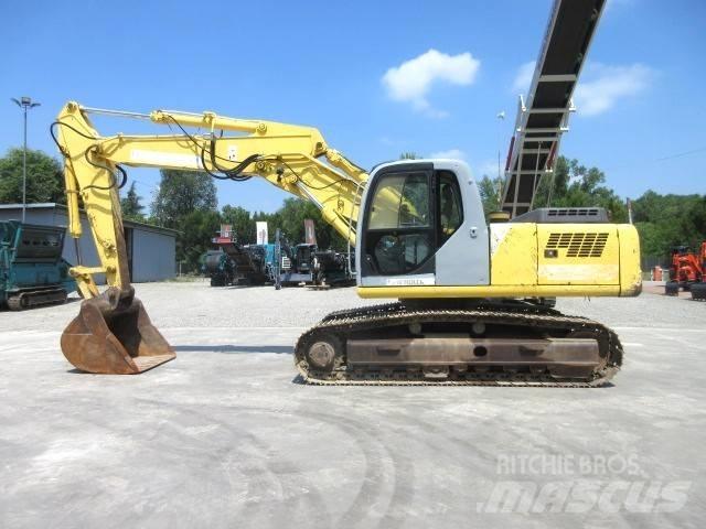 New Holland E 245 Lánctalpas kotrók