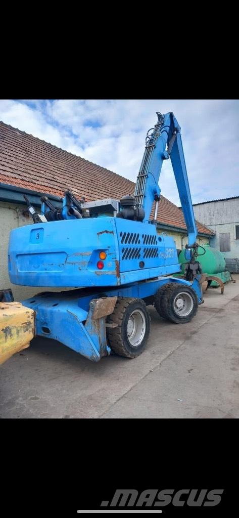 Fuchs MHL 320 Gumikerekes kotrók