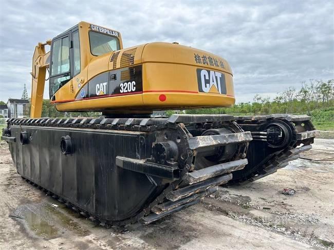 CAT 320 C Kétéltű markolók