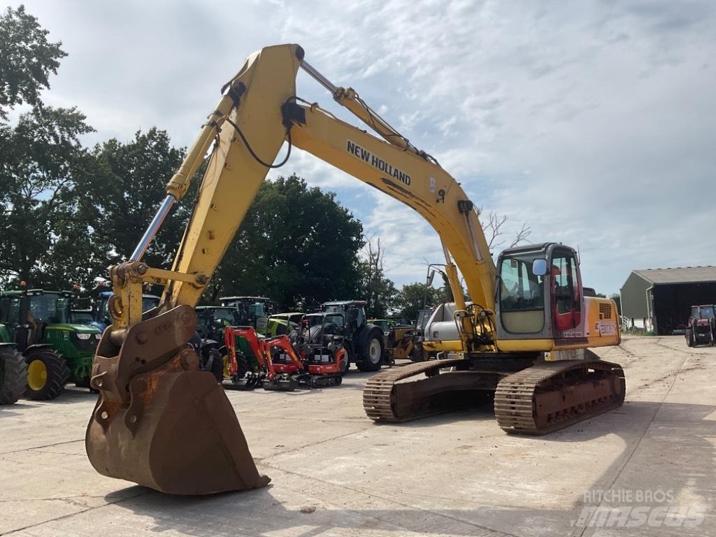 New Holland E 305 Lánctalpas kotrók