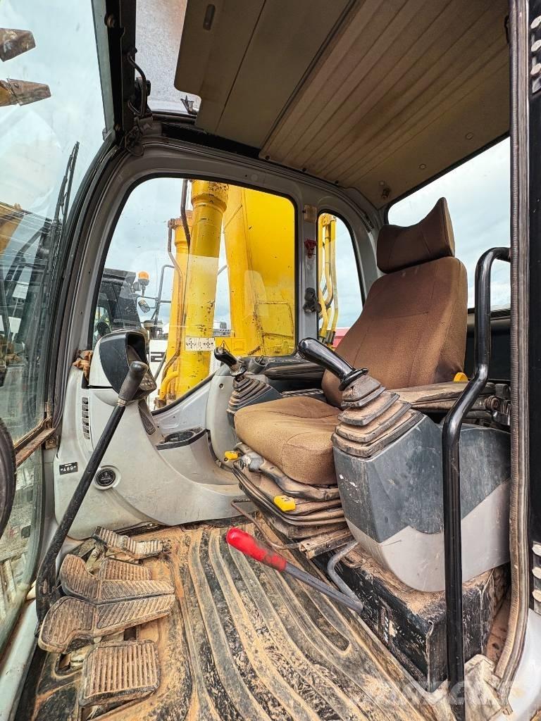 New Holland E 245 B Lánctalpas kotrók