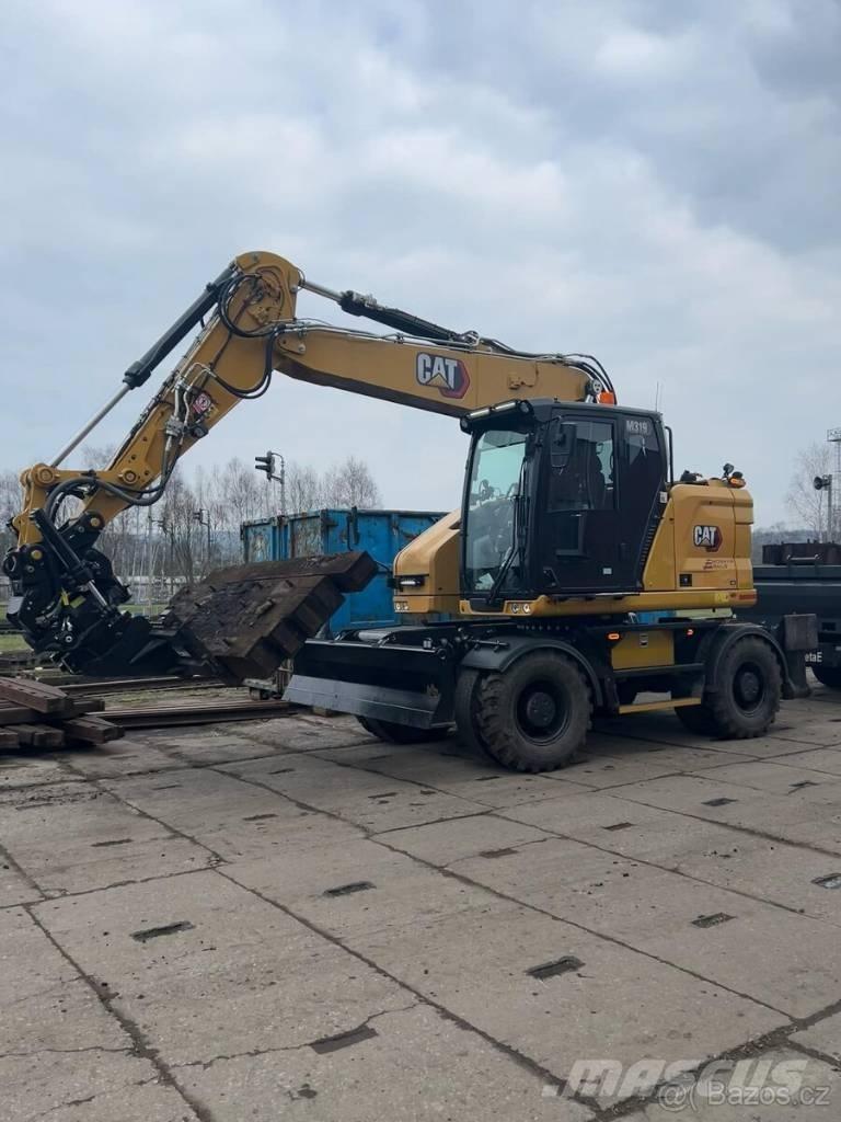 CAT M 319 Gumikerekes kotrók