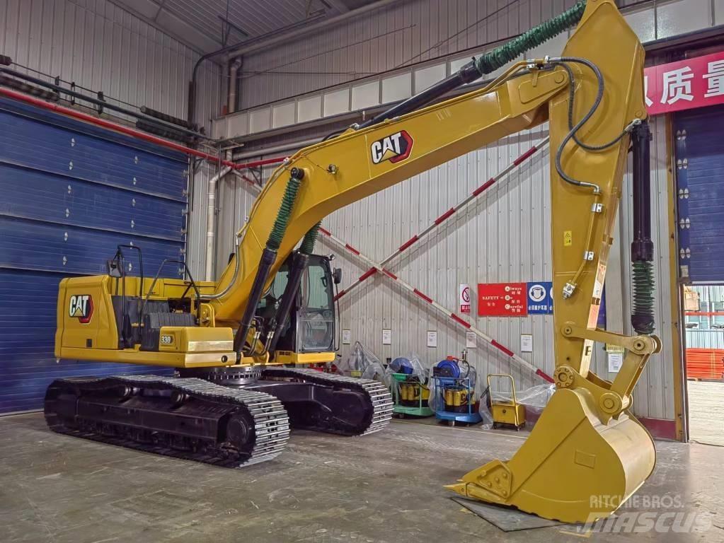 CAT 2021 CAT 330 Gumikerekes kotrók
