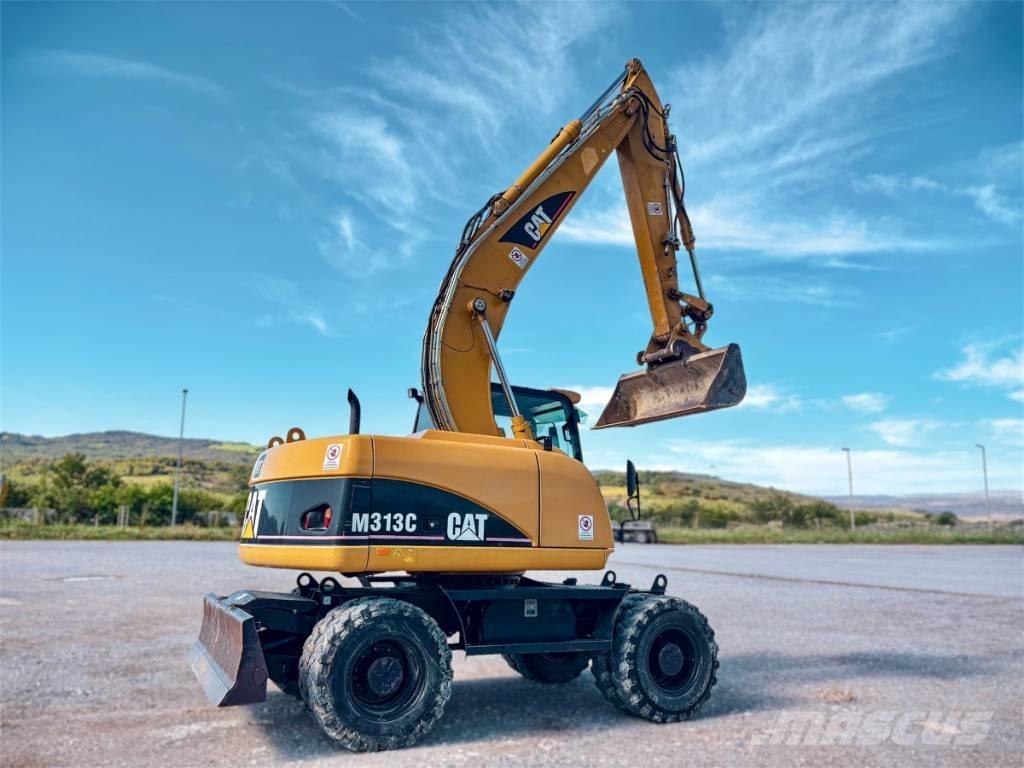 CAT M 313 C Gumikerekes kotrók