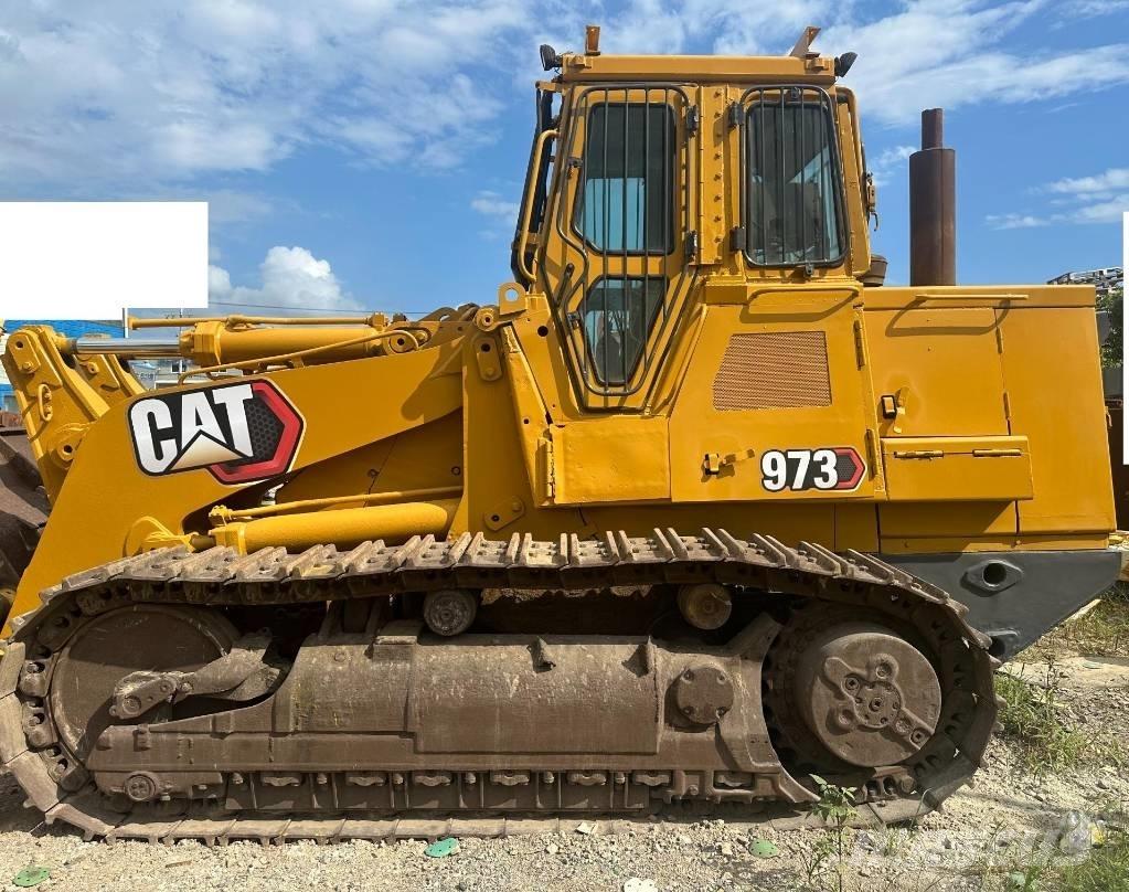 CAT 973 Gumikerekes homlokrakodók