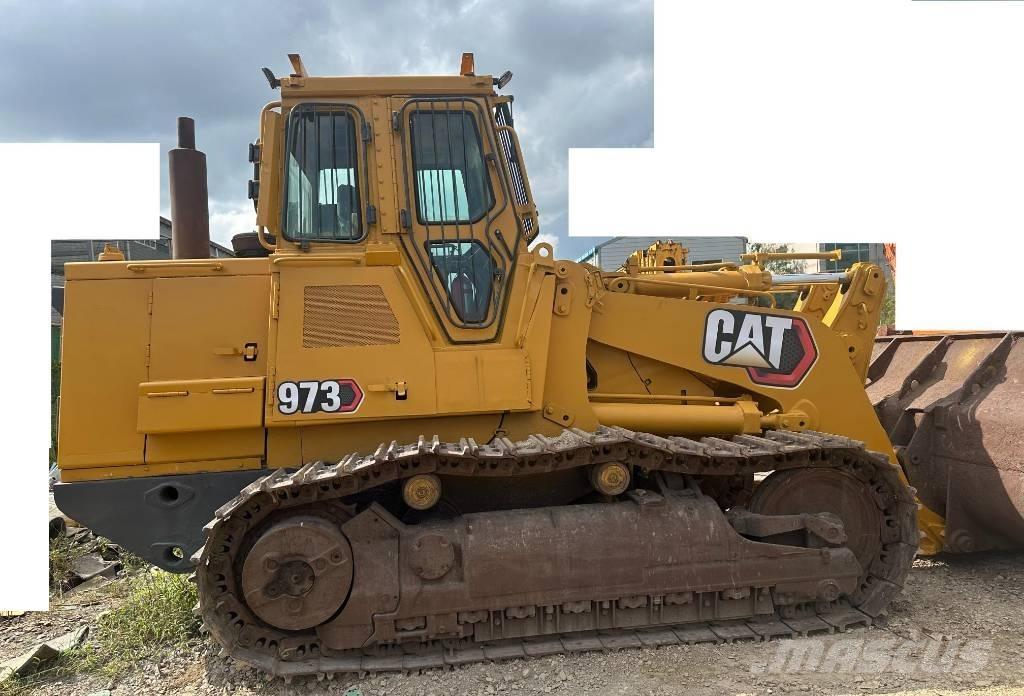 CAT 973 Gumikerekes homlokrakodók