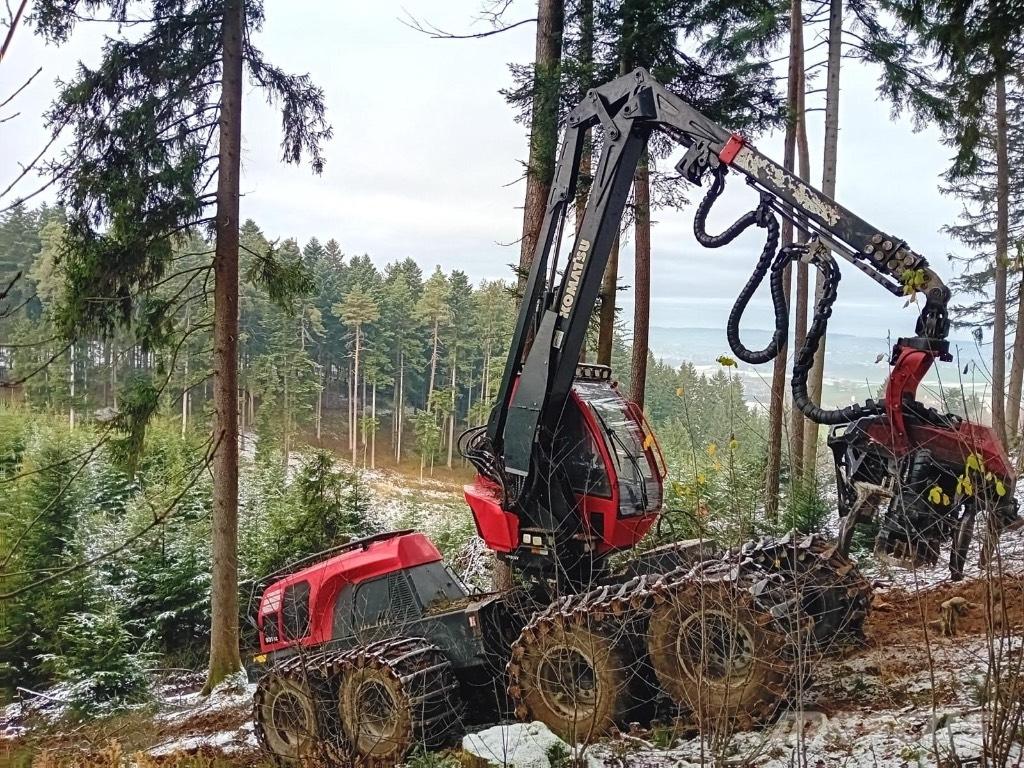 Komatsu 931 XC Betakarítók