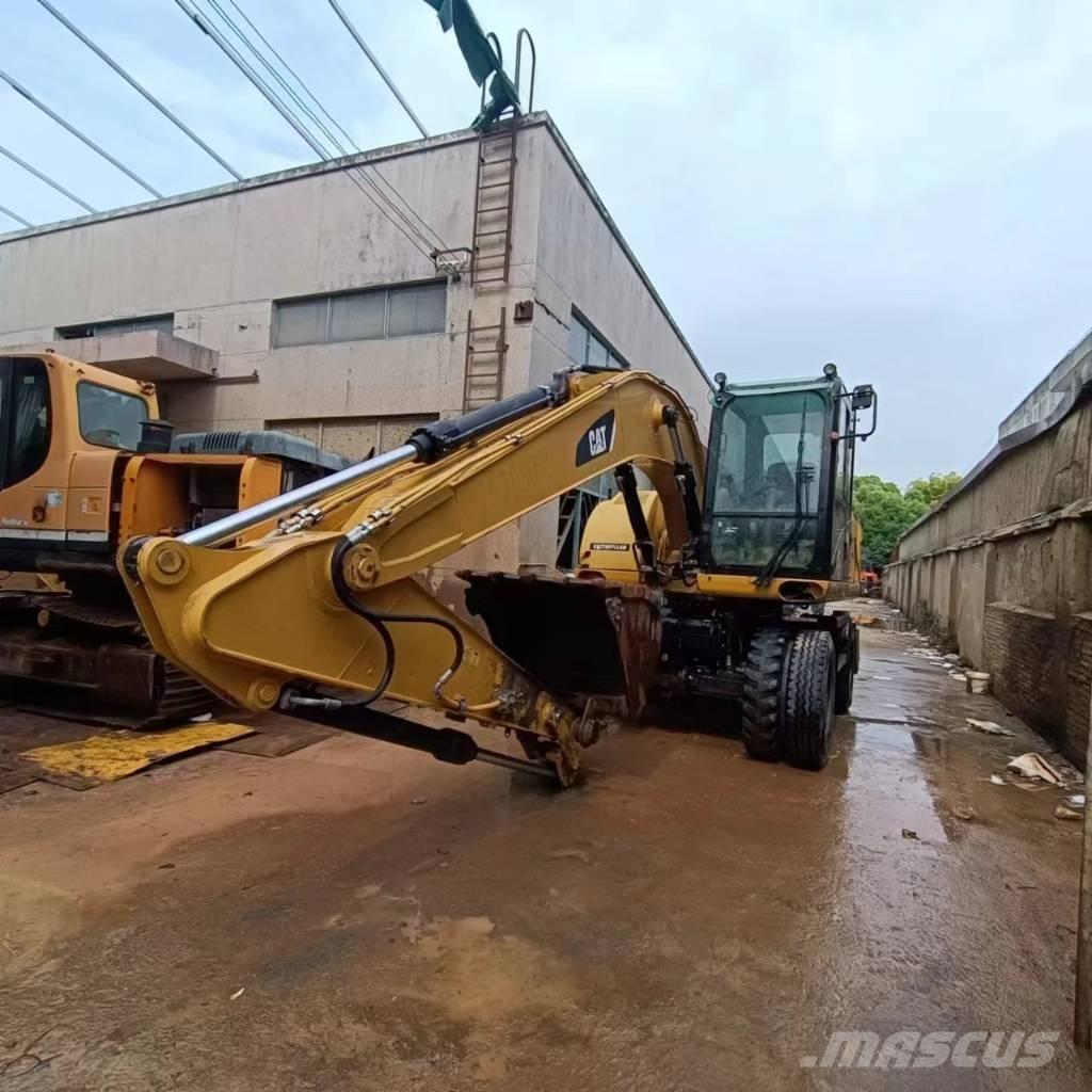 CAT M315D2 Gumikerekes kotrók