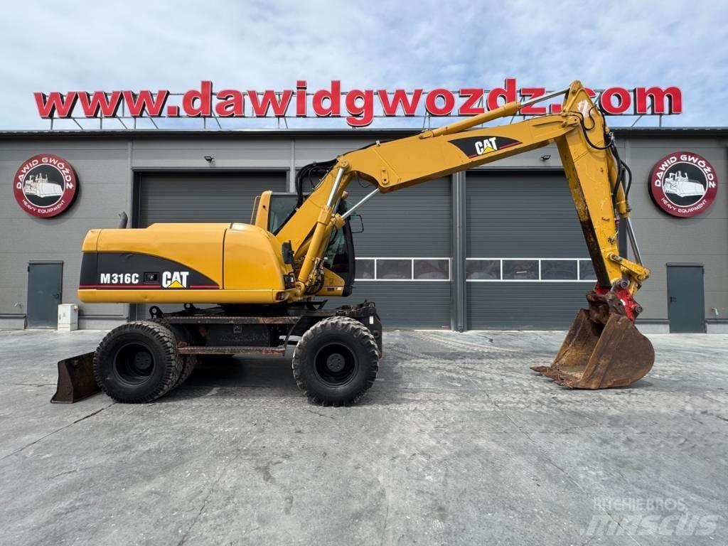 CAT M 316 C Gumikerekes kotrók