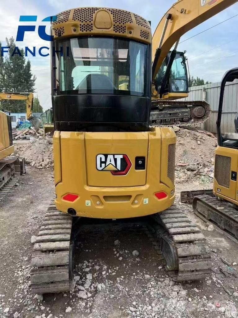 CAT 303 Mini kotrók < 7t