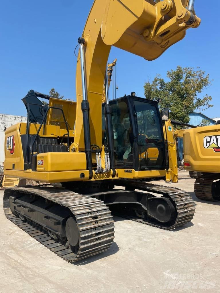 CAT 320 GC Gumikerekes kotrók