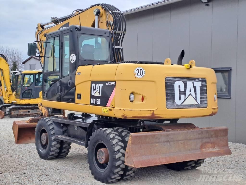 CAT M 316 D Gumikerekes kotrók