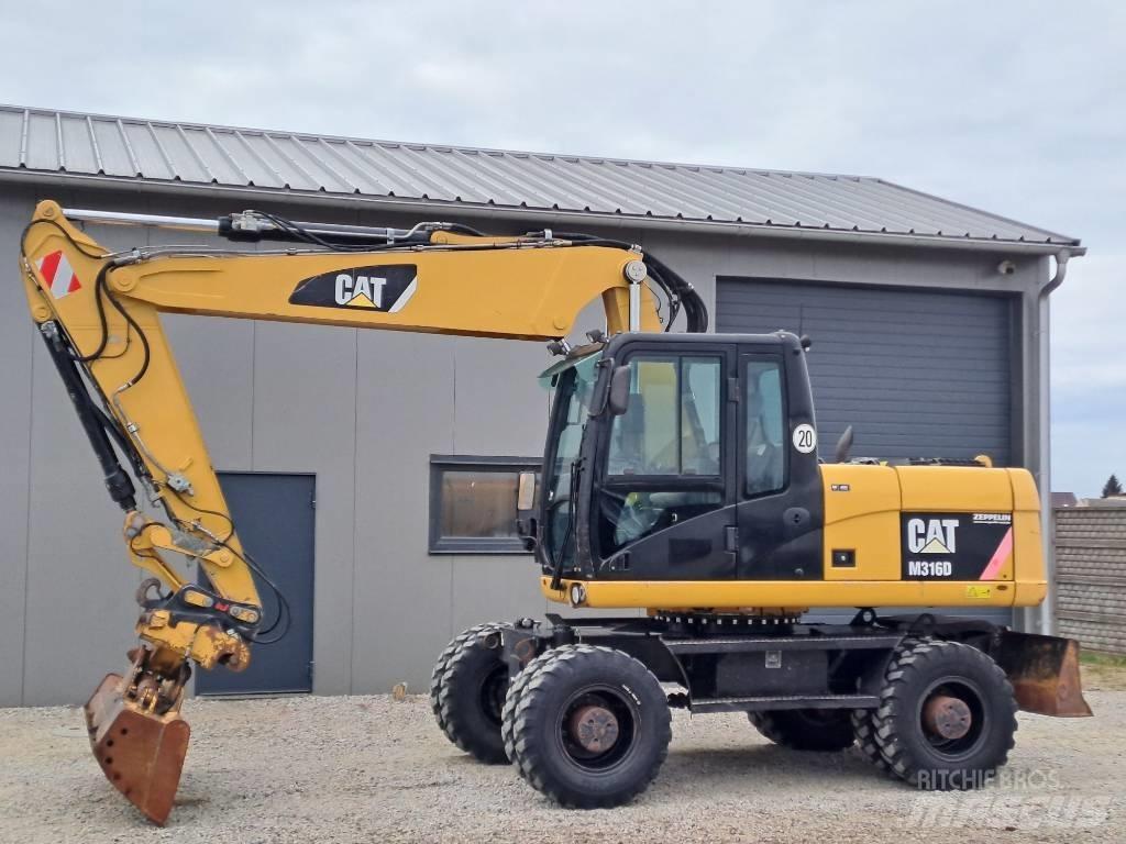 CAT M 316 D Gumikerekes kotrók