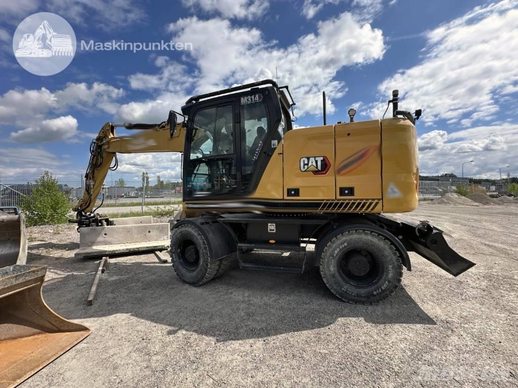 CAT M 314 Gumikerekes kotrók