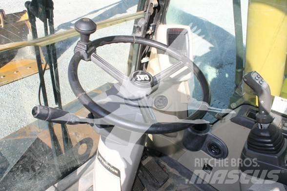 CAT M318C Gumikerekes kotrók