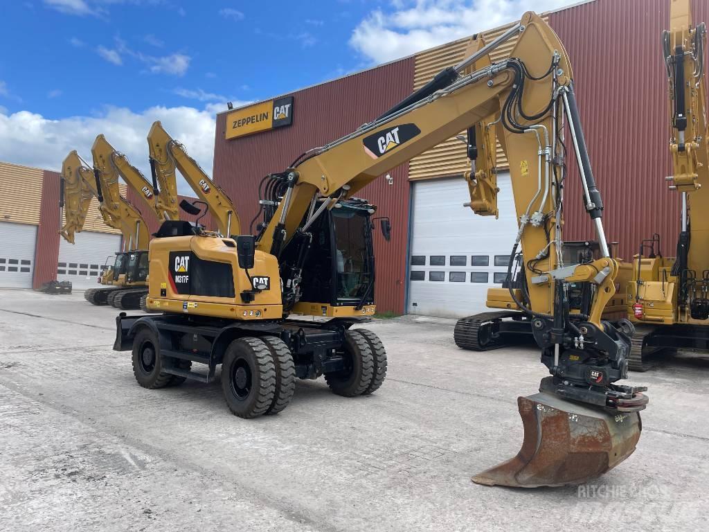 CAT M317F Gumikerekes kotrók