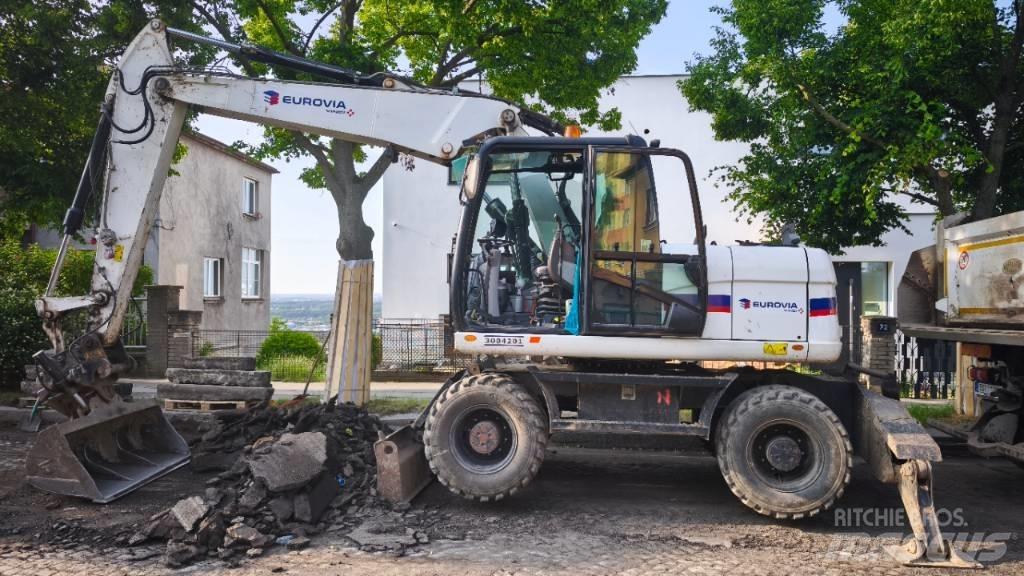 CAT 313 D Gumikerekes kotrók