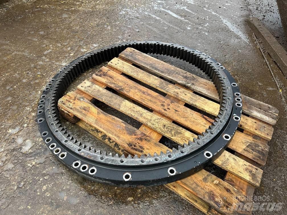 CAT 323 slew ring Tengelyek