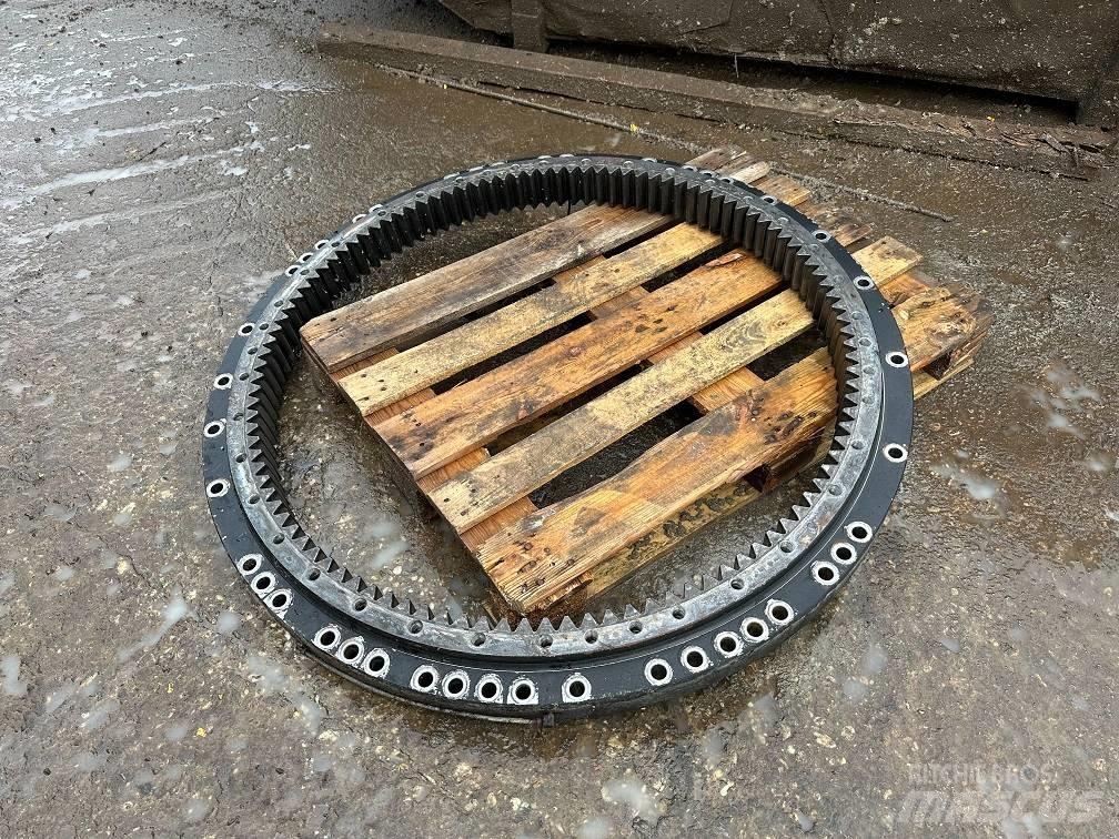 CAT 323 slew ring Tengelyek