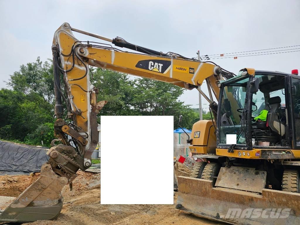 CAT 314F Gumikerekes kotrók