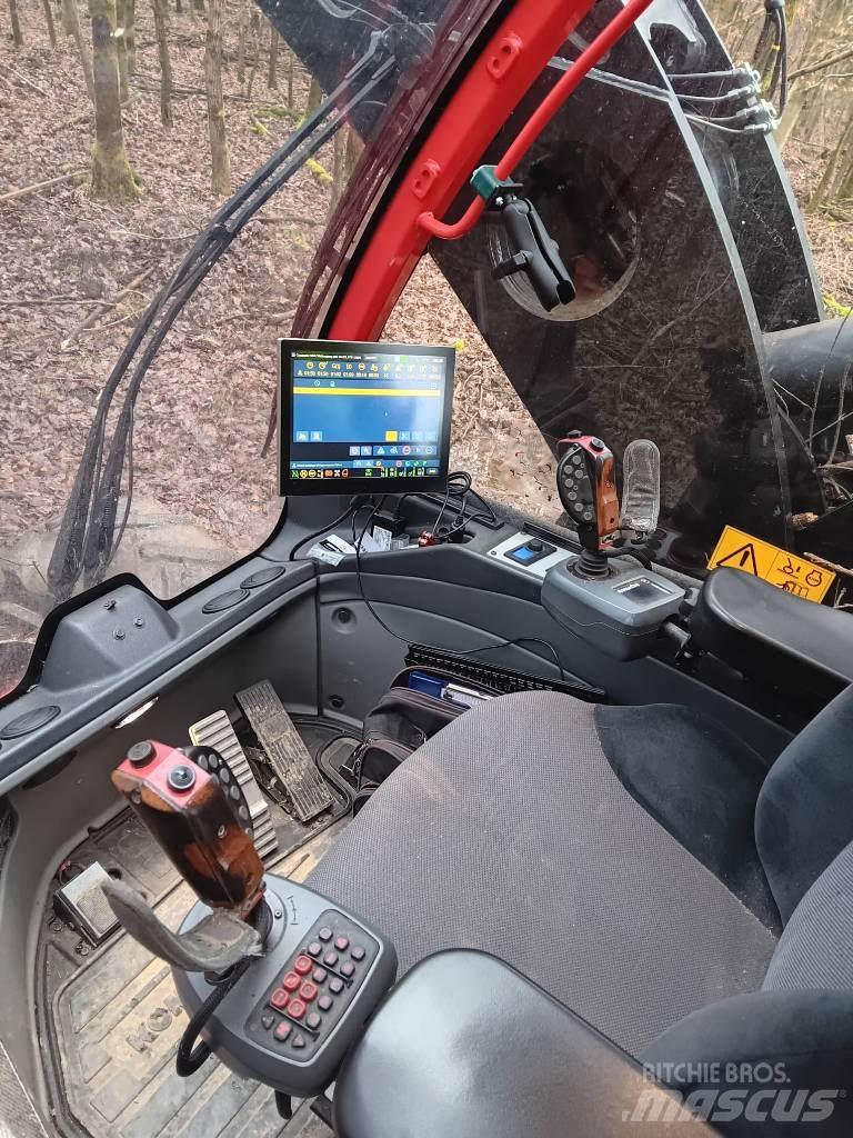 Komatsu 901 XC Betakarítók