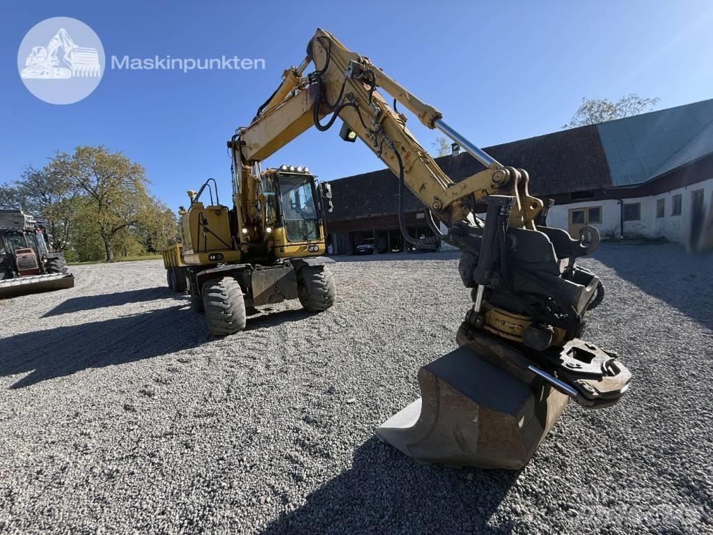 Komatsu PW 148-10 Gumikerekes kotrók
