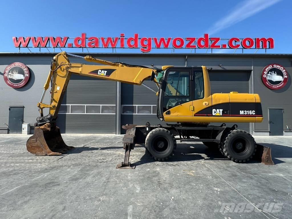 CAT M 316 C Gumikerekes kotrók