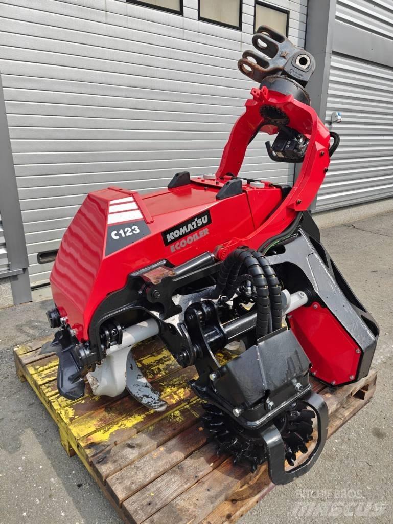 Komatsu C 123 Betakarító fejek