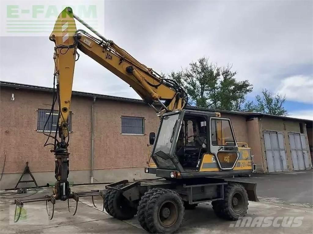 JCB js 130 w Gumikerekes kotrók