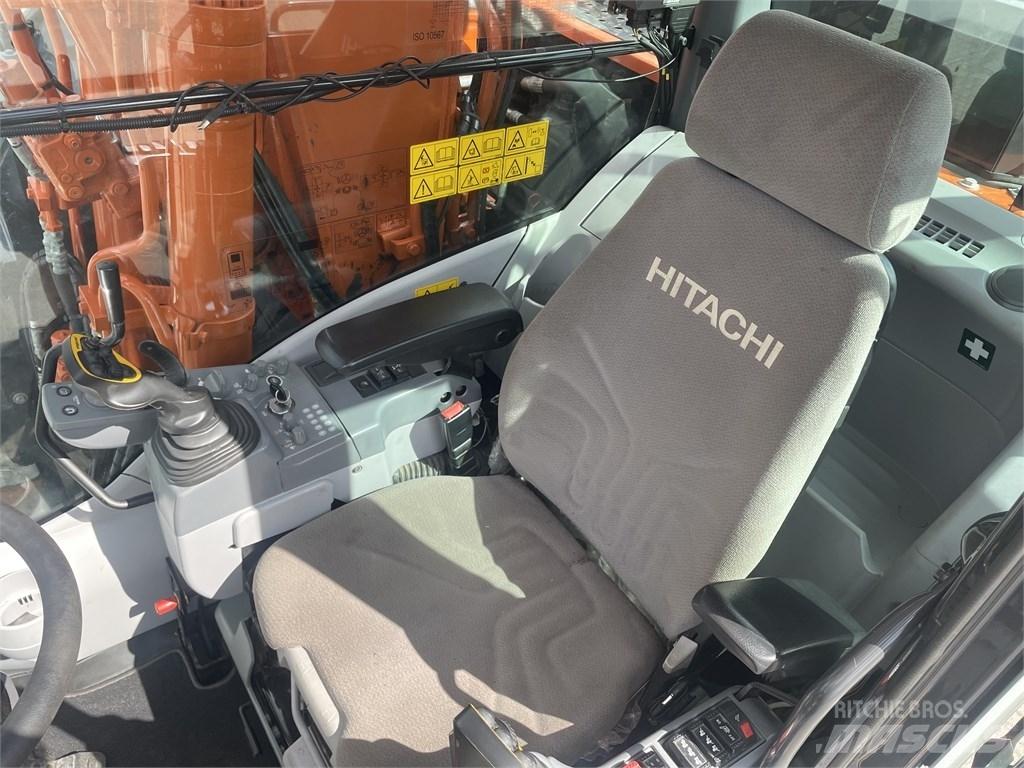 Hitachi ZX 140 W-6 Gumikerekes kotrók