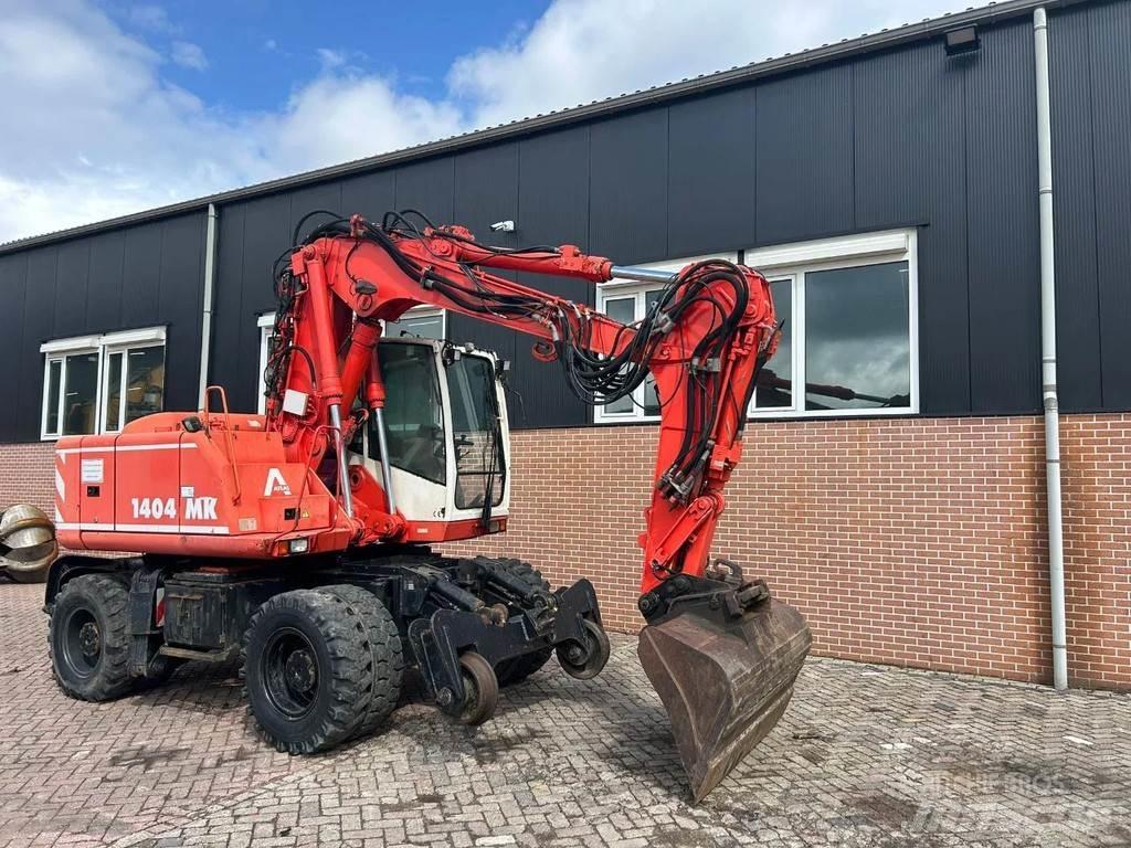Atlas 1404 Gumikerekes kotrók