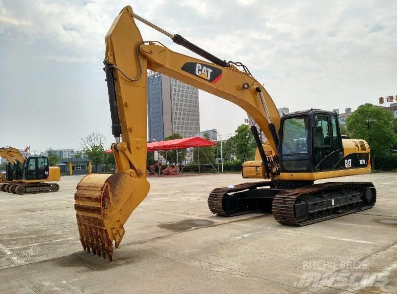 CAT 323 Lánctalpas kotrók