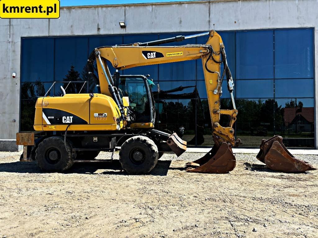 CAT M 313 D Gumikerekes kotrók