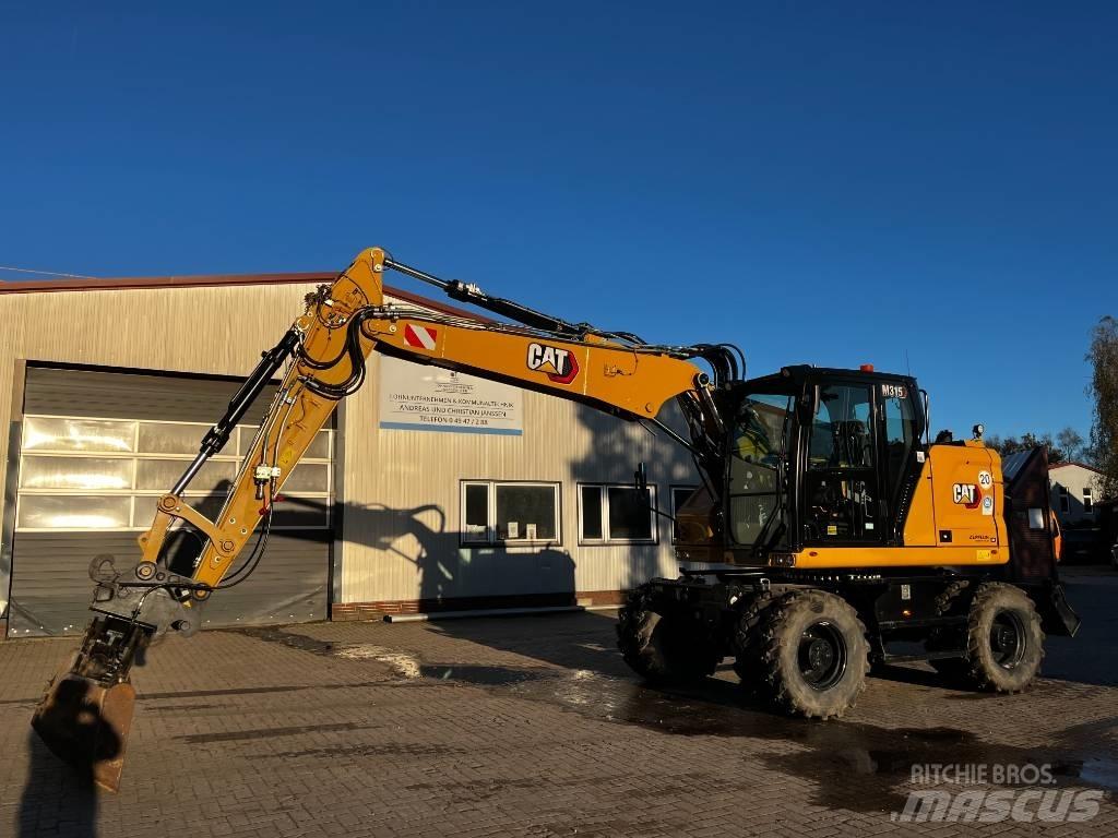 CAT M 315 Gumikerekes kotrók