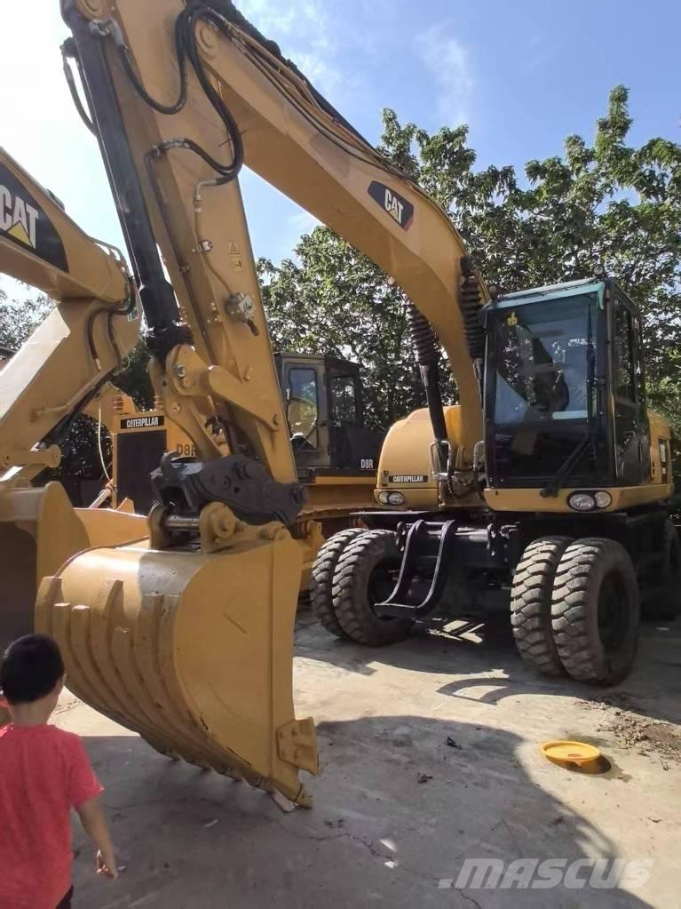 CAT 315 D Gumikerekes kotrók