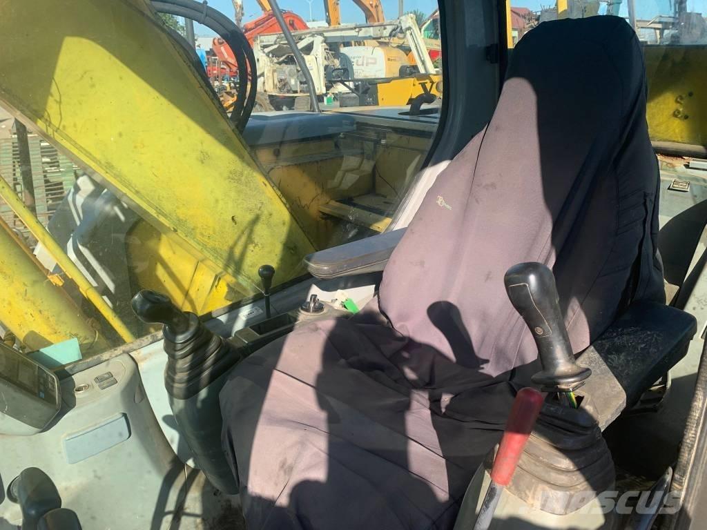 New Holland E 135 SR Lánctalpas kotrók