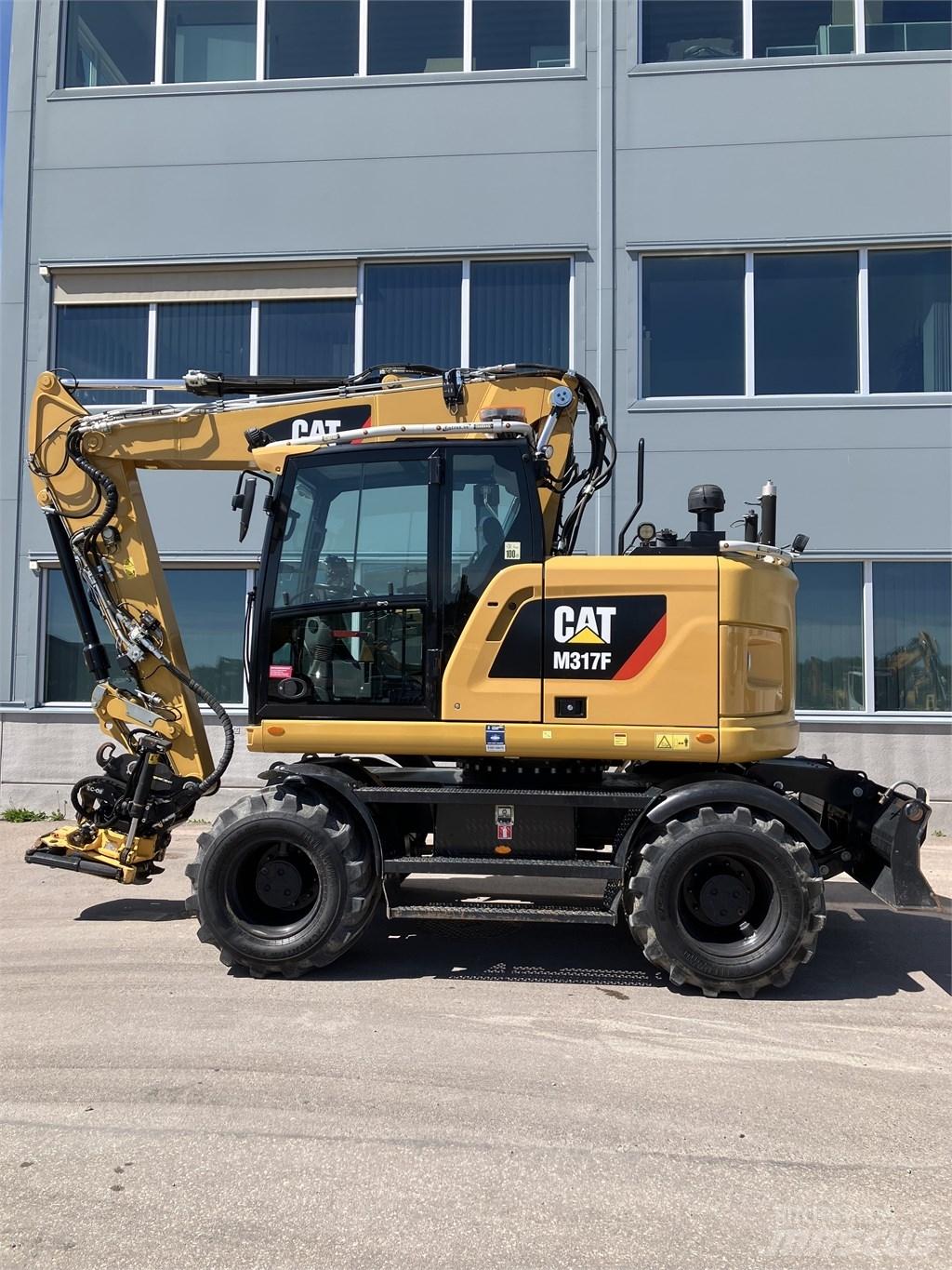 CAT 317 F Gumikerekes kotrók