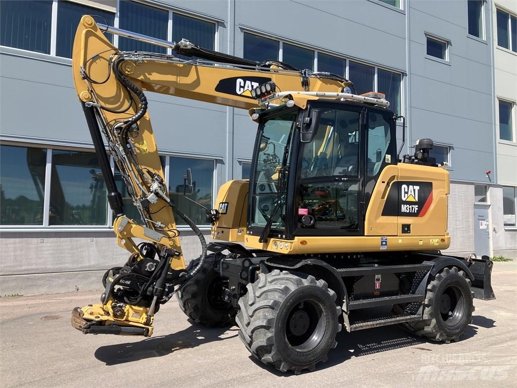 CAT 317 F Gumikerekes kotrók