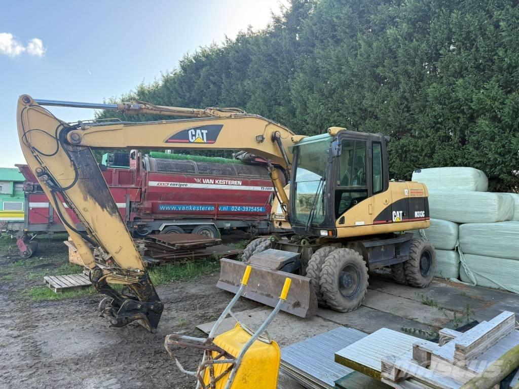 CAT M 313 C Gumikerekes kotrók