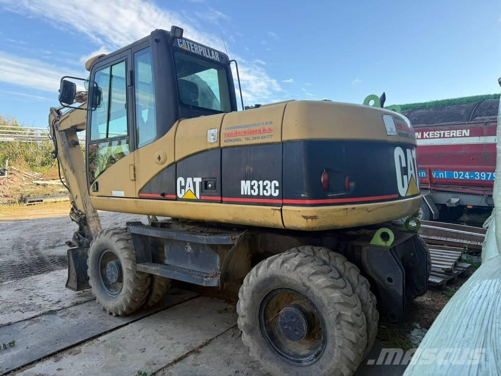 CAT M 313 C Gumikerekes kotrók