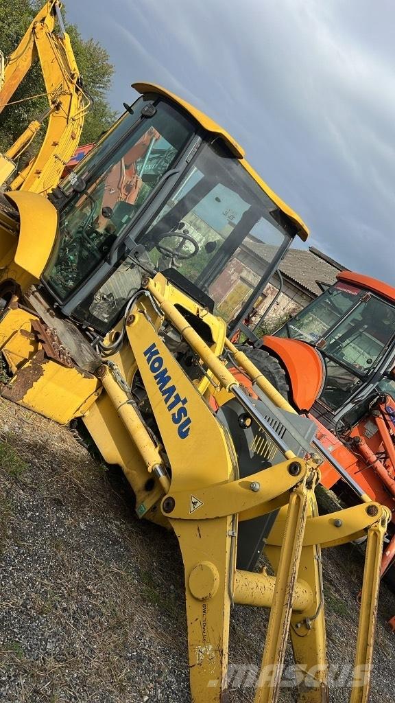 Komatsu WB 93 R Lánctalpak, láncok és futóművek