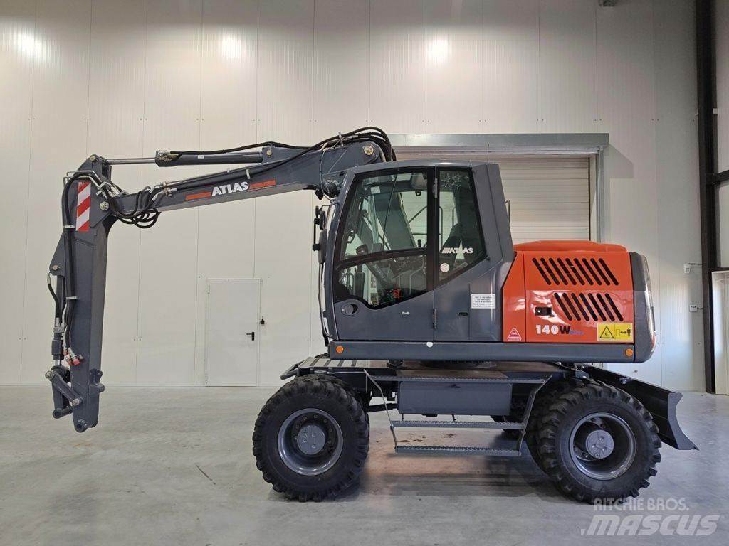 Atlas 140W Gumikerekes kotrók