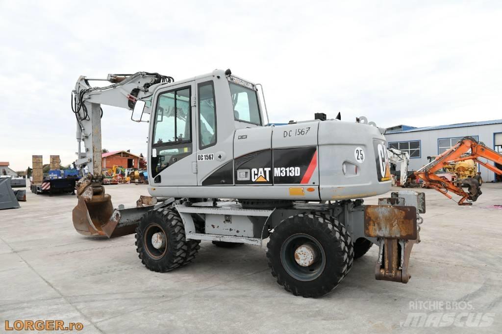 CAT M 313 D Gumikerekes kotrók
