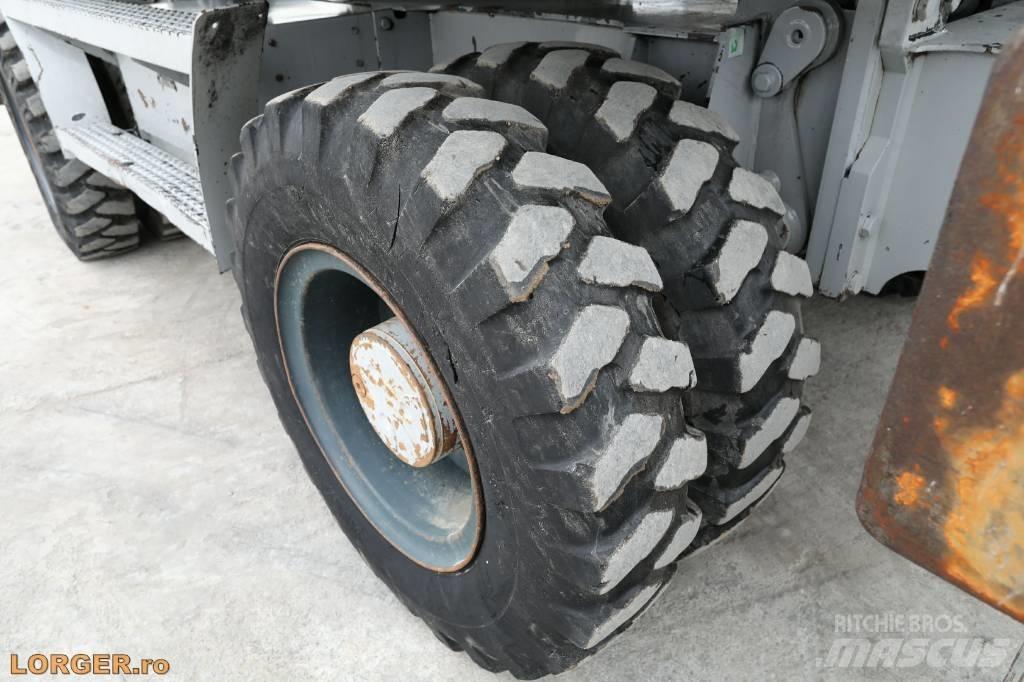 CAT M 313 D Gumikerekes kotrók
