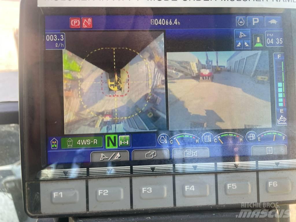 Komatsu PW118-11 Gumikerekes kotrók