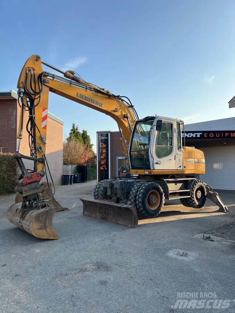 Liebherr A314 Gumikerekes kotrók