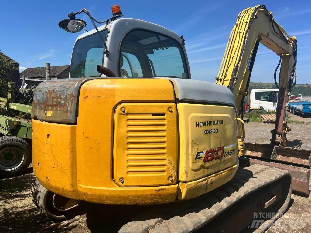 New Holland E 80 Közepes (midi) kotrók 7 t - 12 t