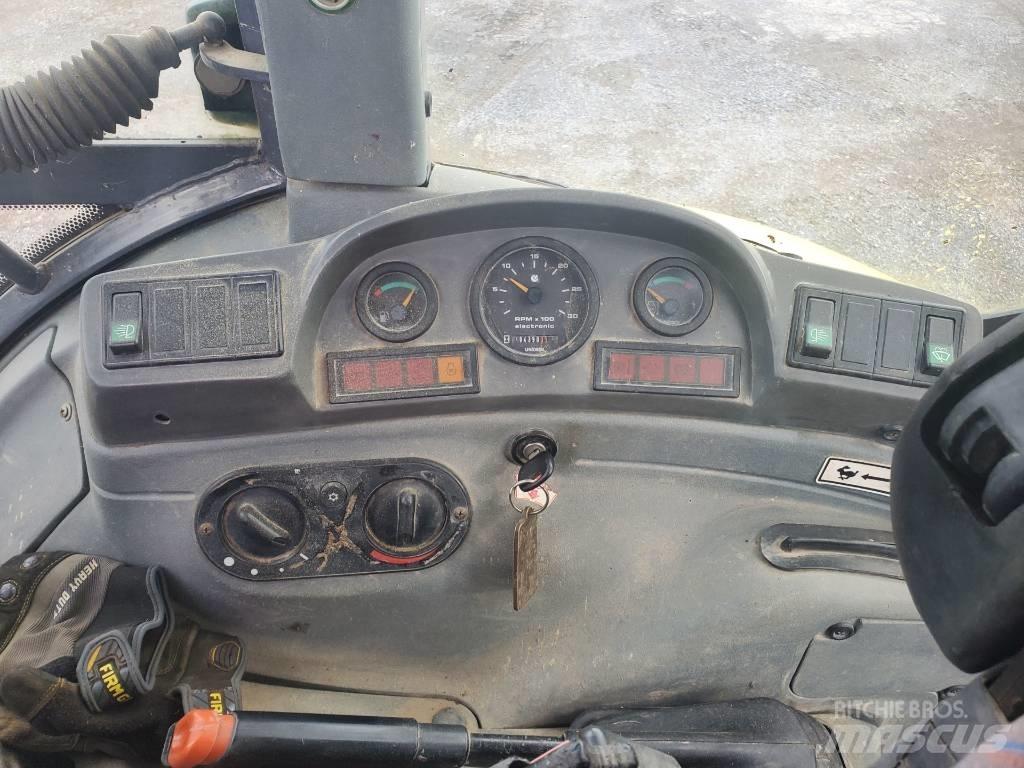 New Holland LB 75 Gumikerekes kotrók