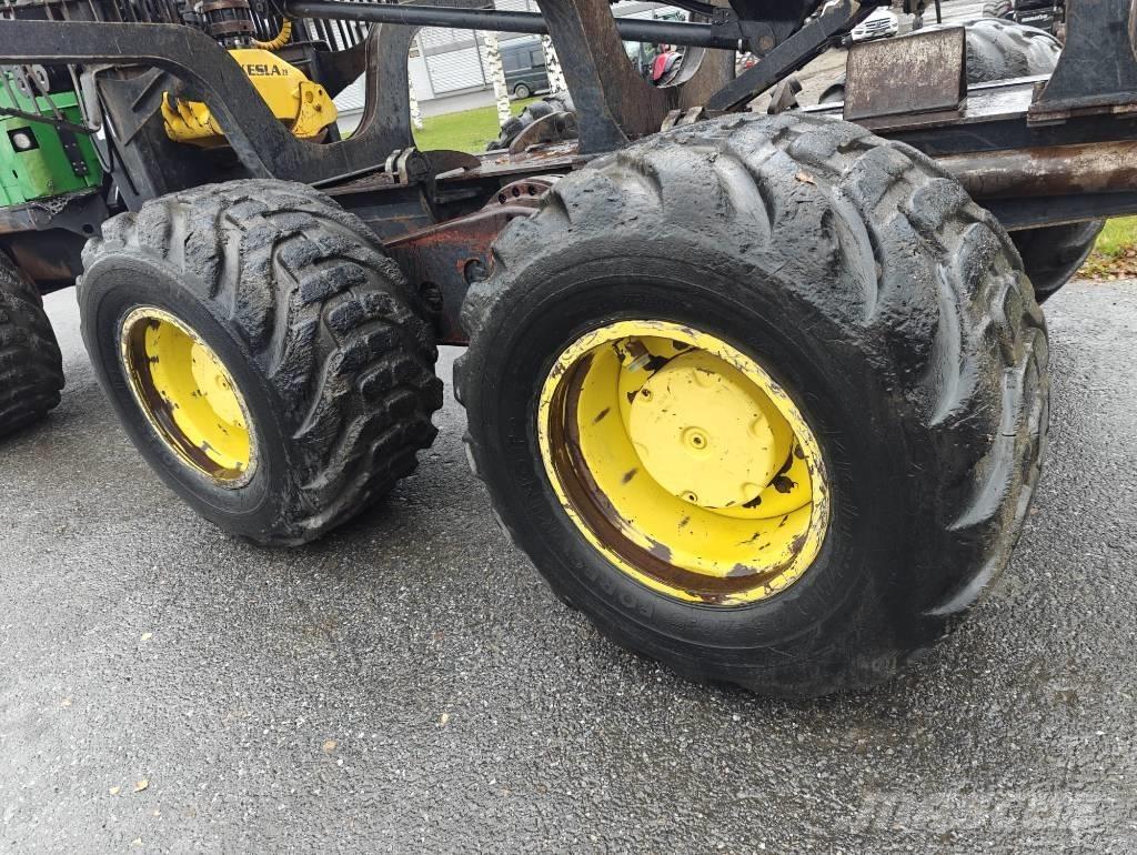 John Deere 1210 E Kihordók