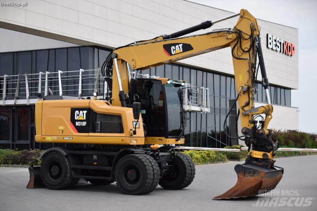 CAT M 318 F Gumikerekes kotrók